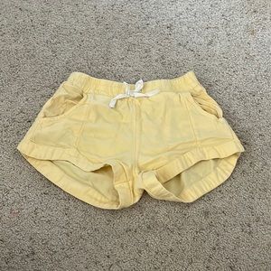 Girls yellow shorts. Size L.